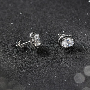 S925 sterling silver earrings featuring oval cubic zirconia with black border accents