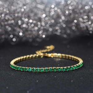 Detail of 925 sterling silver tennis bracelet with 3mm round green zirconia stones