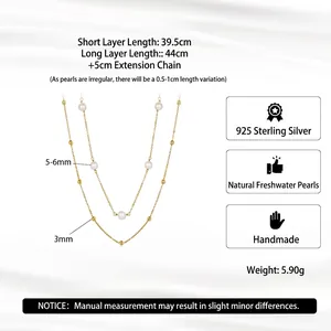 Double-layered 925 sterling silver necklace with freshwater pearls and gold beads