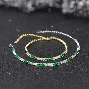 Macro detail of 3mm cubic zirconia tennis bracelets in gold and silver plating