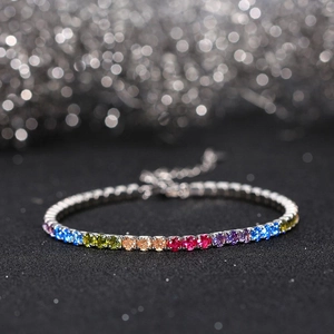 Detail of 925 sterling silver rainbow tennis bracelet with multi-color cubic zirconia