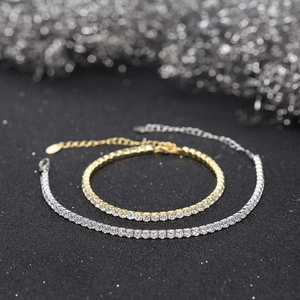 Detail of 3mm cubic zirconia tennis bracelets in gold and silver plating with prong setting