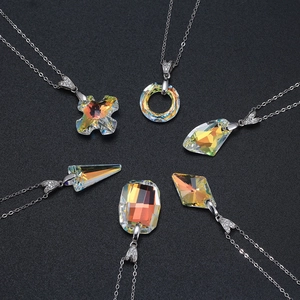 Macro view of crystal pendant collection with geometric cuts and sparkling facets