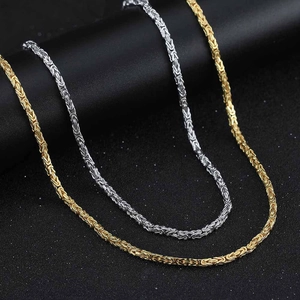 925 sterling silver Byzantine chain necklace in gold and silver finish on display