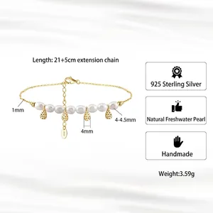 S925 sterling silver anklet with freshwater pearls and golden teardrop charms on white base