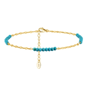 Detail of S925 sterling silver gold-plated anklet with turquoise beads and lobster clasp