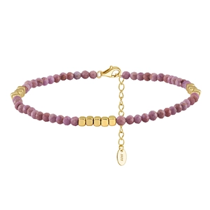 Macro shot of S925 silver tag and purple beads on a minimalist summer anklet