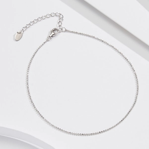 Detailed view of S925 sterling silver beaded anklet with lobster clasp and extender chain