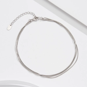 Detail of S925 sterling silver triple layer snake chain anklet with lobster clasp closure