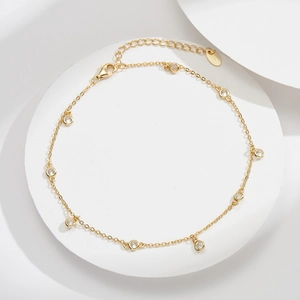 Minimalist S925 sterling silver anklet in gold finish with round zircon charms