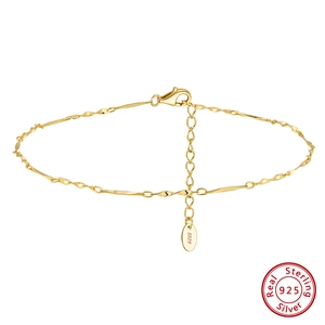 Detail view of gold S925 sterling silver anklet with Mobius twist links and lobster clasp