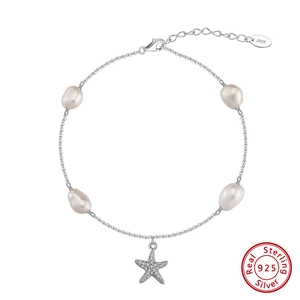 Detail of S925 sterling silver anklet with freshwater pearls and starfish charm