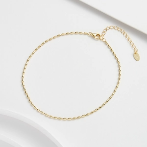 Minimalistisches S925 Silber-Fußkettchen mit ovalen Goldperlen und Karabinerverschluss