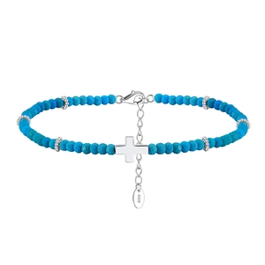 Macro view of S925 sterling silver cross pendant and turquoise beaded chain