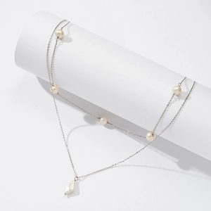 Detailed view of S925 sterling silver layered necklace with pearls and rhombus pendant