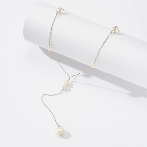 Elegant S925 silver Y-shaped lariat necklace with white freshwater pearls on white display