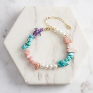 Detail of multi-color natural stone beads on S925 sterling silver lobster clasp bracelet