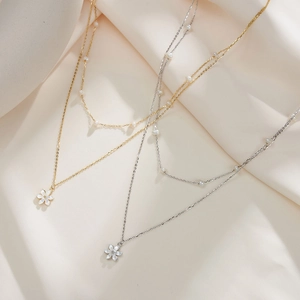 Double-layered 925 silver necklace with flower pearl pendant and golden finish