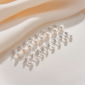 Elegant set of 7 pairs graduated freshwater pearl earrings with S925 silver studs