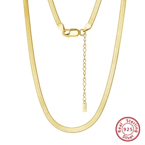 Detail of gold S925 sterling silver herringbone chain with lobster clasp and extension