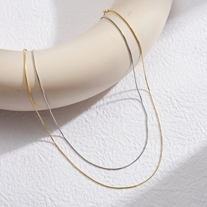 Minimalist S925 sterling silver snake bone necklaces in gold and silver finishes