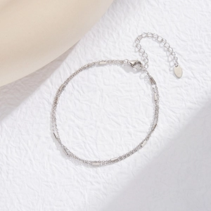 Close-up of S925 sterling silver double-layer bamboo chain bracelet with lobster clasp