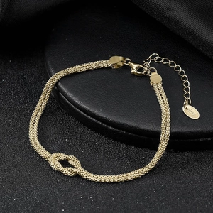 Detailed view of S925 sterling silver braided chain bracelet with knot design and lobster clasp