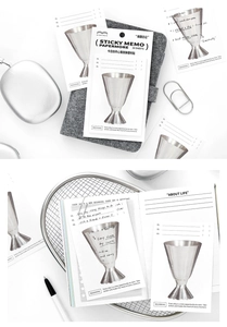 Detailed view of cocktail shaker memo pad with index and motivational English quotes