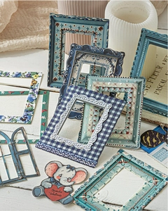 Detailed view of vintage garden theme frame stickers and card set on white wood