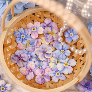 Retro hand-drawn floral stickers in blue and purple shades for DIY scrapbooking decor