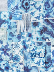 Detailed blue and white tie-dye decorative paper set with vintage artistic floral patterns