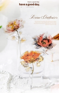 Detailed view of vintage floral PET stickers with gold outlines for scrapbooking deco