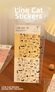 Close-up of clear PET stickers with minimalist black and white line cat drawings, 2-piece set