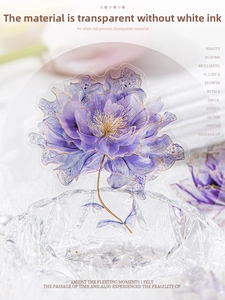Macro detail of transparent purple flower PET stickers with gold outline on glass bowl