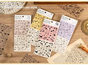 Close-up of cute PET cat stickers set for scrapbooking featuring hand-drawn illustrations