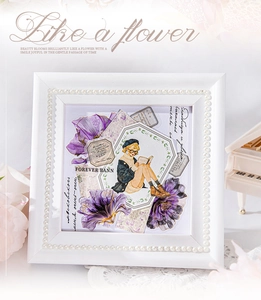 Close-up of floral PET stickers with girl illustration in a pearl frame for scrapbooking