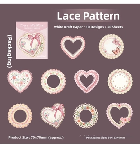 Flat lay of vintage lace floral stickers made of white kraft paper for DIY scrapbooking