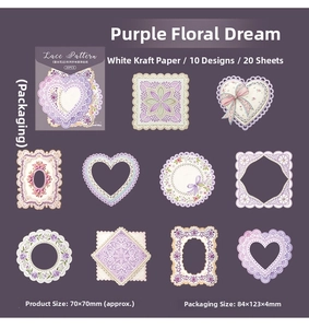 Detailed view of purple lace paper stickers with intricate hollow designs for DIY scrapbooks