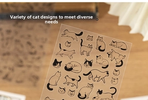 Close-up of cute hand-drawn cat stickers with transparent texture on wooden surface