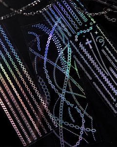 Detailed macro of laser iridescent chain stickers with reflective holographic finish