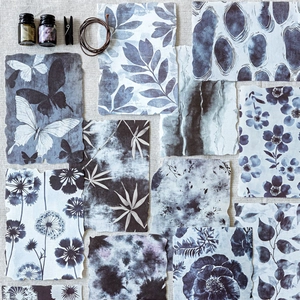Blue vintage tie-dye scrapbooking paper set with butterfly and floral prints for DIY crafts