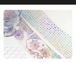 Detailed macro view of holographic iridescent spider web PET tape for DIY scrapbooking