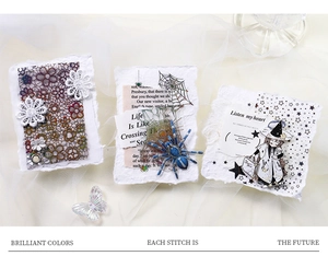 Detail of artistic paper craft tags featuring lace flowers and vintage magic themes