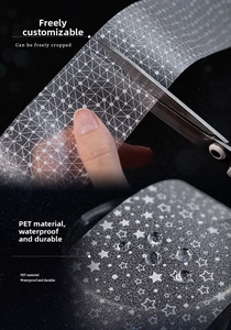 Detail of waterproof PET decorative tape with silver starry patterns and grid lines