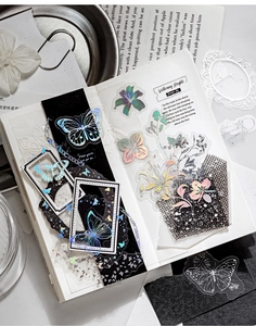 Detailed view of holographic PET stickers with vintage butterfly and floral hand-drawn patterns