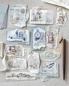 Close-up of vintage PET stickers featuring retro sewing machine and clock motifs for DIY scrapbooking
