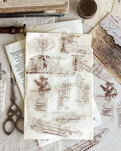 Macro shot of vintage industrial stickers with sextant and mechanical part designs