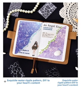 Water ripple translucent PET stickers in deep blue and purple on a brown leather journal