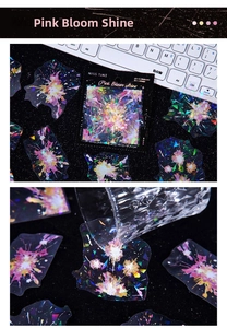 Detail of laser PET flower stickers with shimmering pearlescent effect for scrapbooking