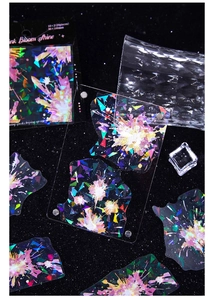 Detailed macro of holographic laser firework PET stickers with iridescent pearlescent finish